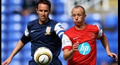 Former England defender Gareth Southgate (left) in action against the Army FA at Reading's Madejski Stadium
